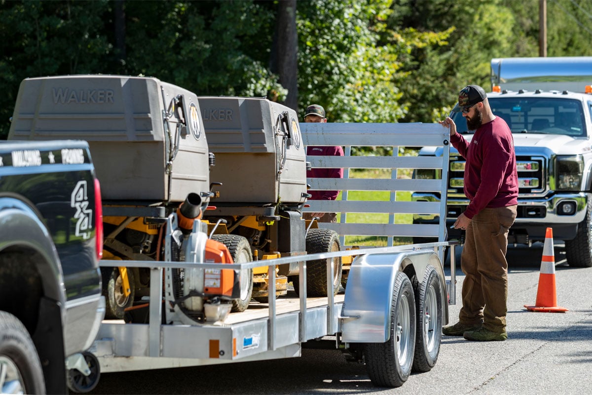 Two Tractors On Utility Landscape Wood Deck 2.0 Trailer